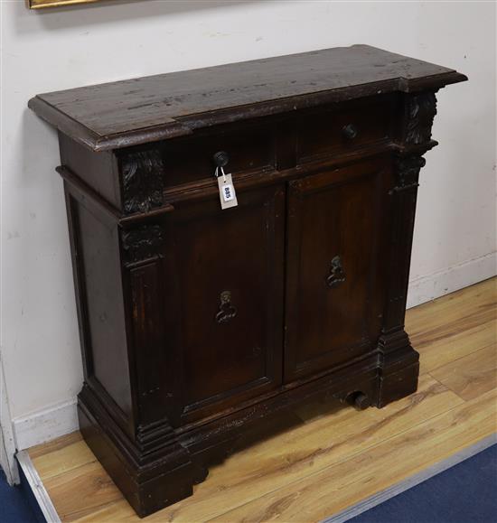 An 18th century Tuscan walnut side cabinet W.94cm